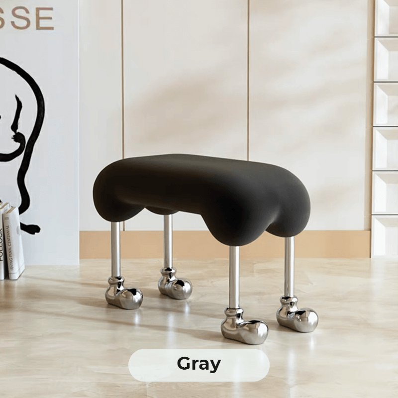 Close-up of the Nordic dog makeup stool, highlighting the comfortable ergonomic seat and sturdy legs.