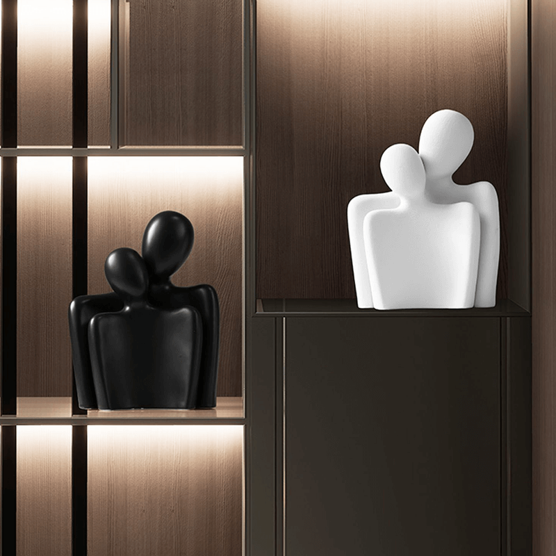 Close-up view of the Nordic Couple Sculpture showcasing its elegant design and finish.