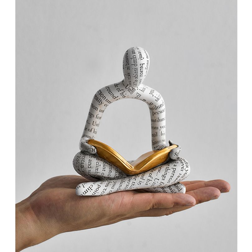 Nordic abstract figurine placed on a modern desk, enhancing the workspace.
