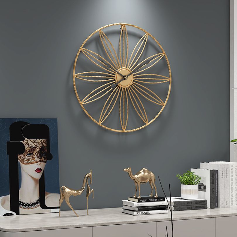 Nordic Silent Gold Wall Clock showcasing its elegant design on a living room wall.