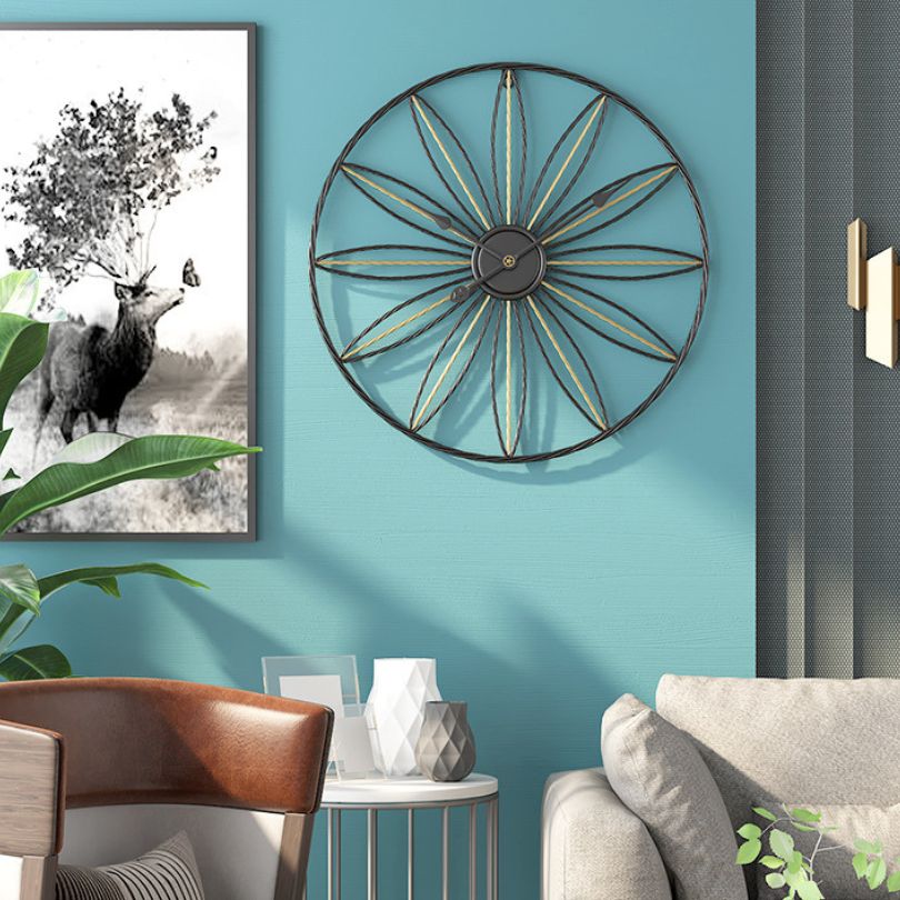 Nordic Silent Gold Wall Clock showcasing its elegant design on a living room wall.