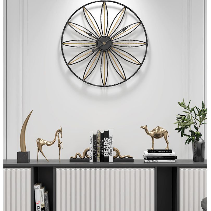 Nordic Silent Gold Wall Clock showcasing its elegant design on a living room wall.