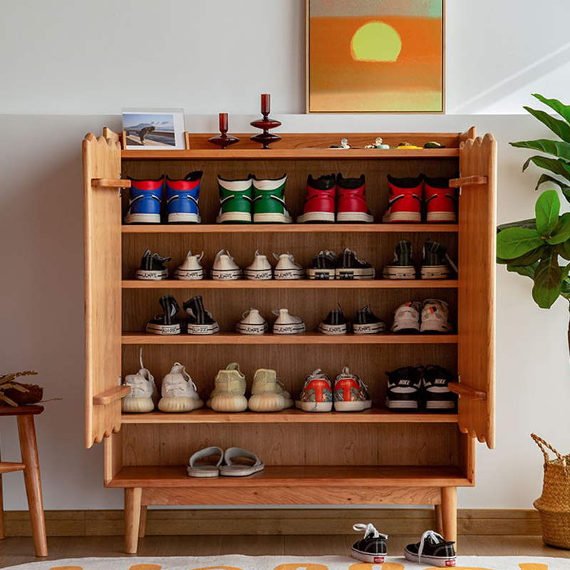 Front-facing view of Nordica shoe cabinet showing dual doors and solid wood finish, ideal for modern entryways.