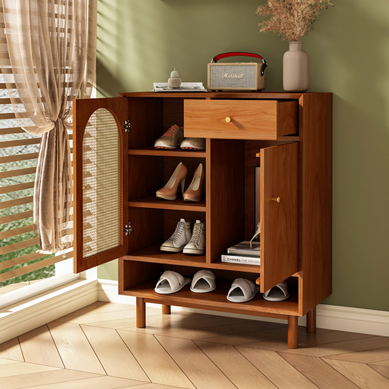 Front view of the Nordic rattan shoe cabinet with shelves and drawers.