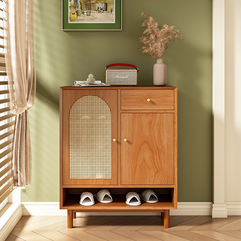 Side angle of the wooden shoe cabinet featuring rattan design and ample storage space.