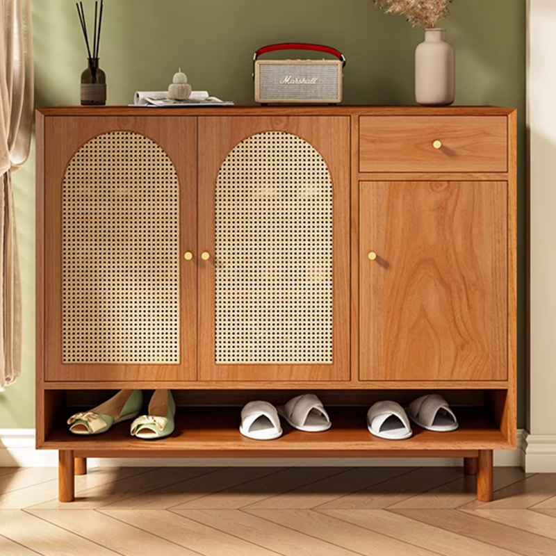 Front view of the Nordic rattan shoe cabinet with shelves and drawers.