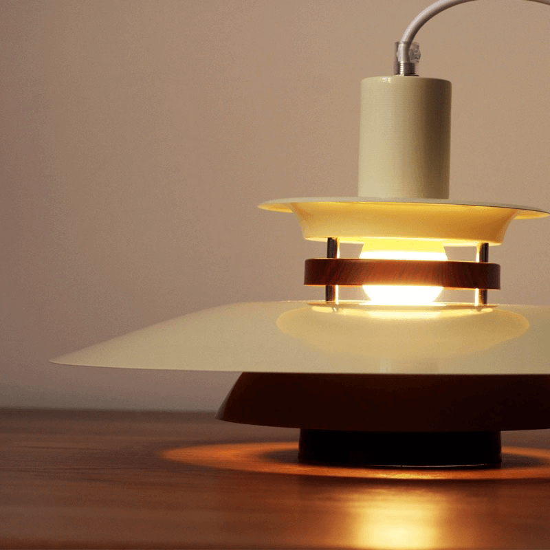 Close-up of the Nordic Style PH5 Danish Pendant Lamp highlighting the warm glow of the LED light.