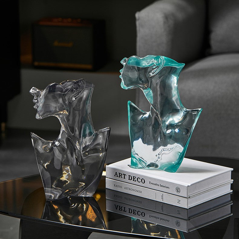 Nordic transparent art statue showcasing its luminous design and modern aesthetic from a side angle.