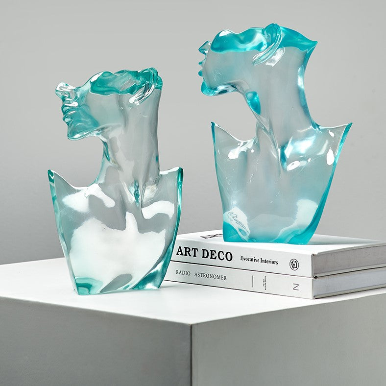 Nordic transparent art statue showcasing its luminous design and modern aesthetic from a side angle.