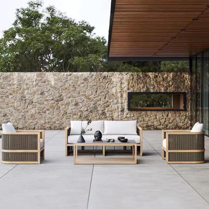 Close-up of the detailed acrylic rope seating of the rattan patio set, emphasizing comfort and design.