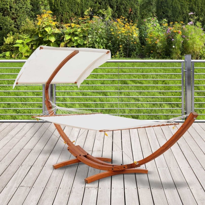 Cozy setup of the patio hammock in a lush garden.