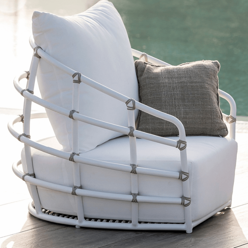 Luxury wicker furniture for poolside, showcasing a beautifully woven design that invites comfort.