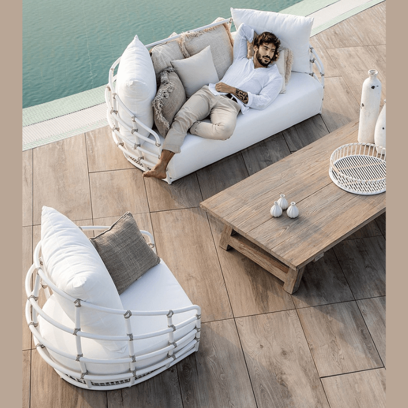Luxury wicker furniture for poolside, showcasing a beautifully woven design that invites comfort.