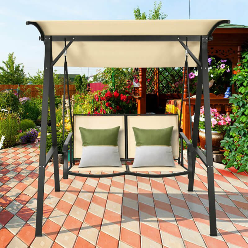 Family enjoying leisure time in the outdoor hammock under the adjustable sunshade.