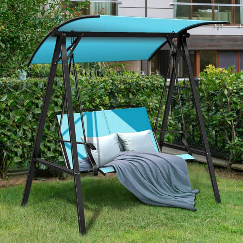 Adjustable canopy hammock set up in a sunny patio, showcasing its waterproof fabric.