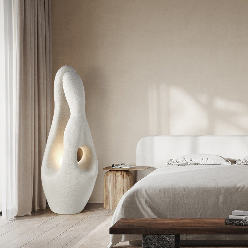 Minimalist LED floor lamp showcasing elegant design in a contemporary living room.