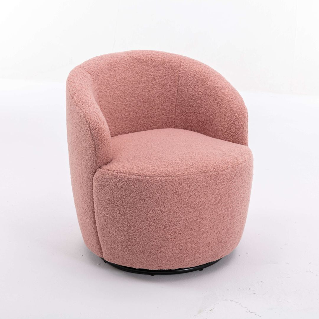 Side angle of pink swivel teddy accent chair emphasizing the black powder-coated base.