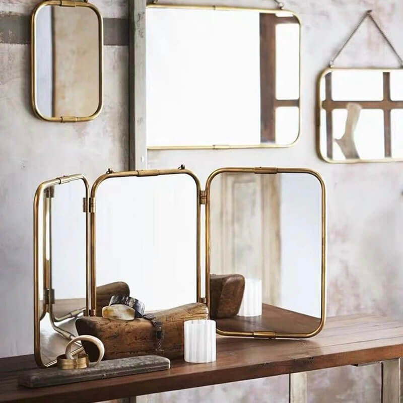 Close-up view of the chic portable vintage dressing mirror showcasing its antique detailing.