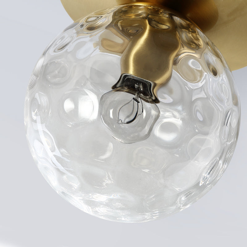 Flush mount light installed in a stylish bedroom, illuminating the space with a warm glow.