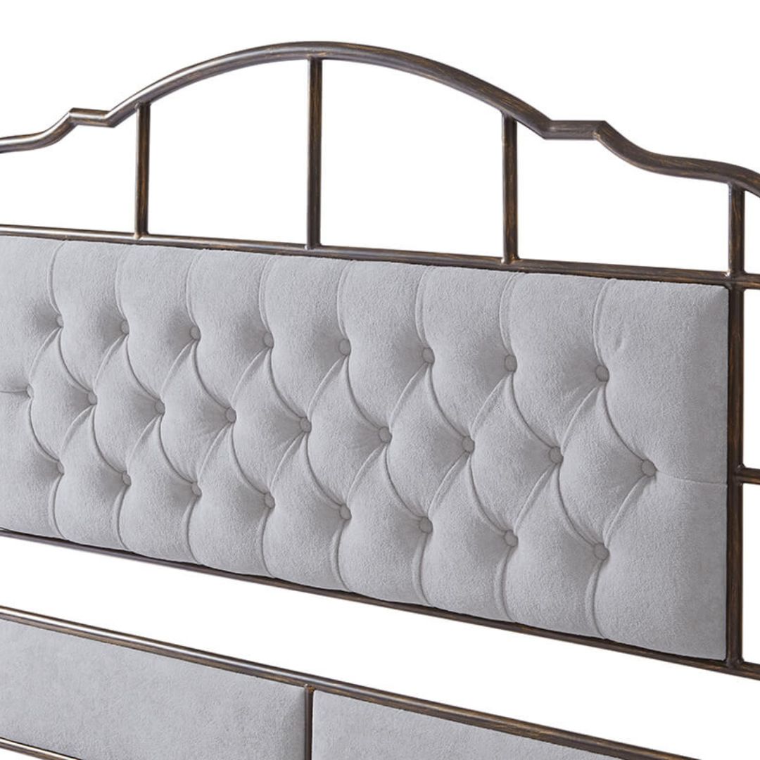 Close-up of the plush velvet upholstery on the headboard and footboard of the queen bed frame, showcasing its high-quality craftsmanship.