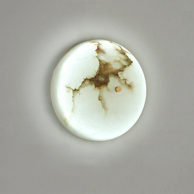 Close-up view of the marble shade on the LED wall sconce highlighting its modern aesthetic
