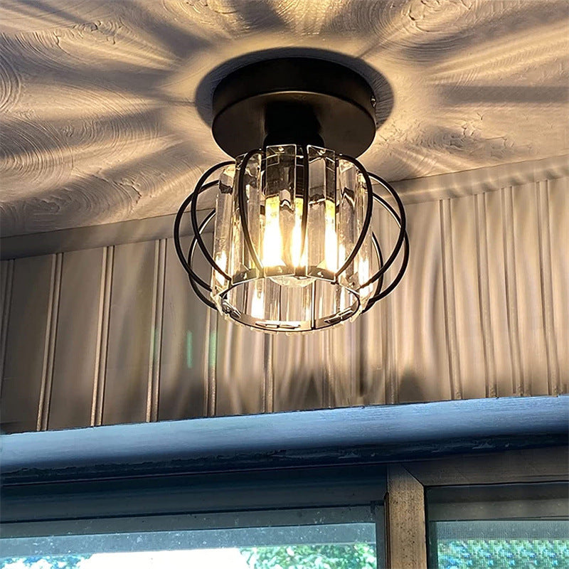 Close-up view of the crystal detailing on the black ceiling light