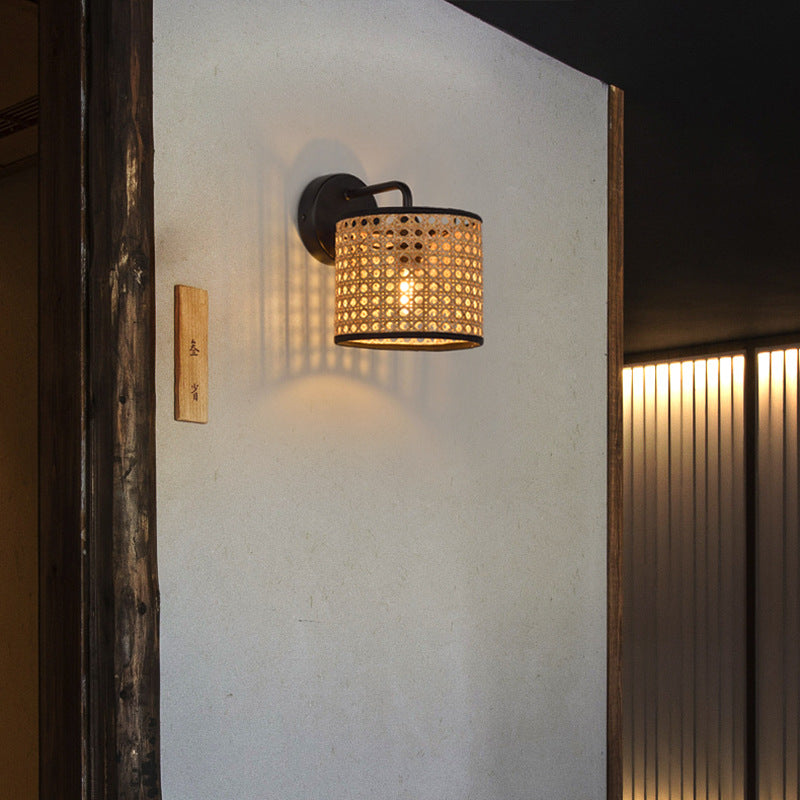 The rattan wall light installed in a cozy living room, creating a warm ambiance.