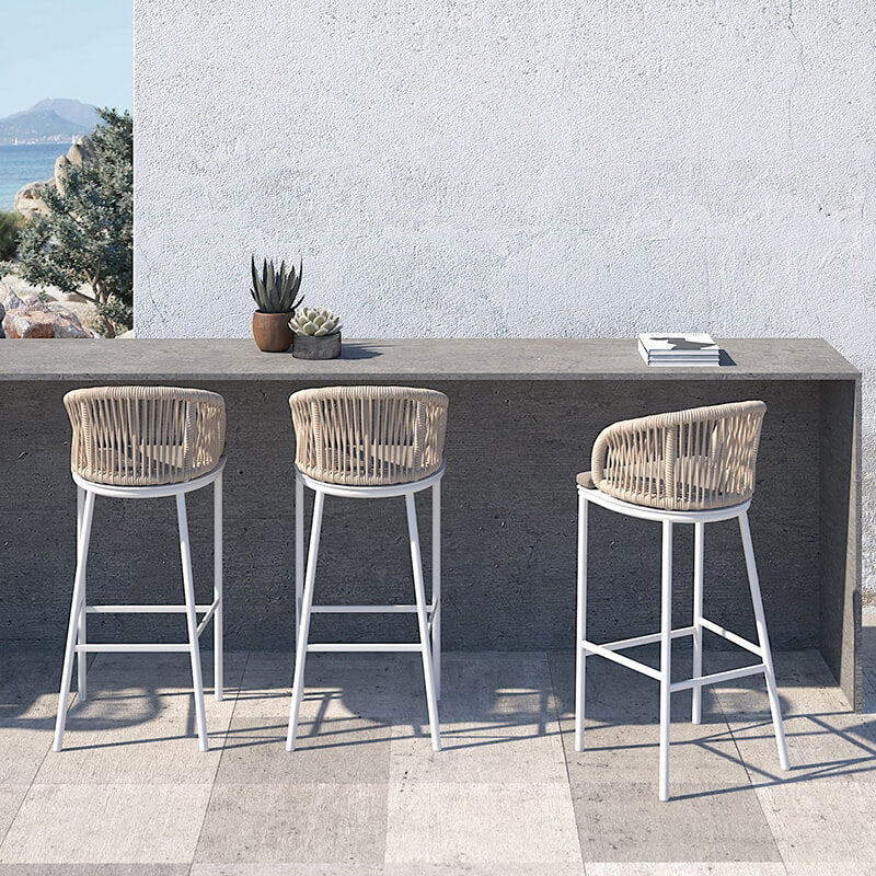 Close-up of rattan high bar chair showcasing olive rope details.