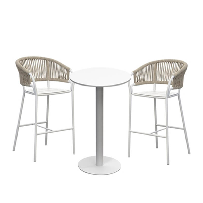 Elegant rattan high bar table set with aluminum legs in outdoor setting.