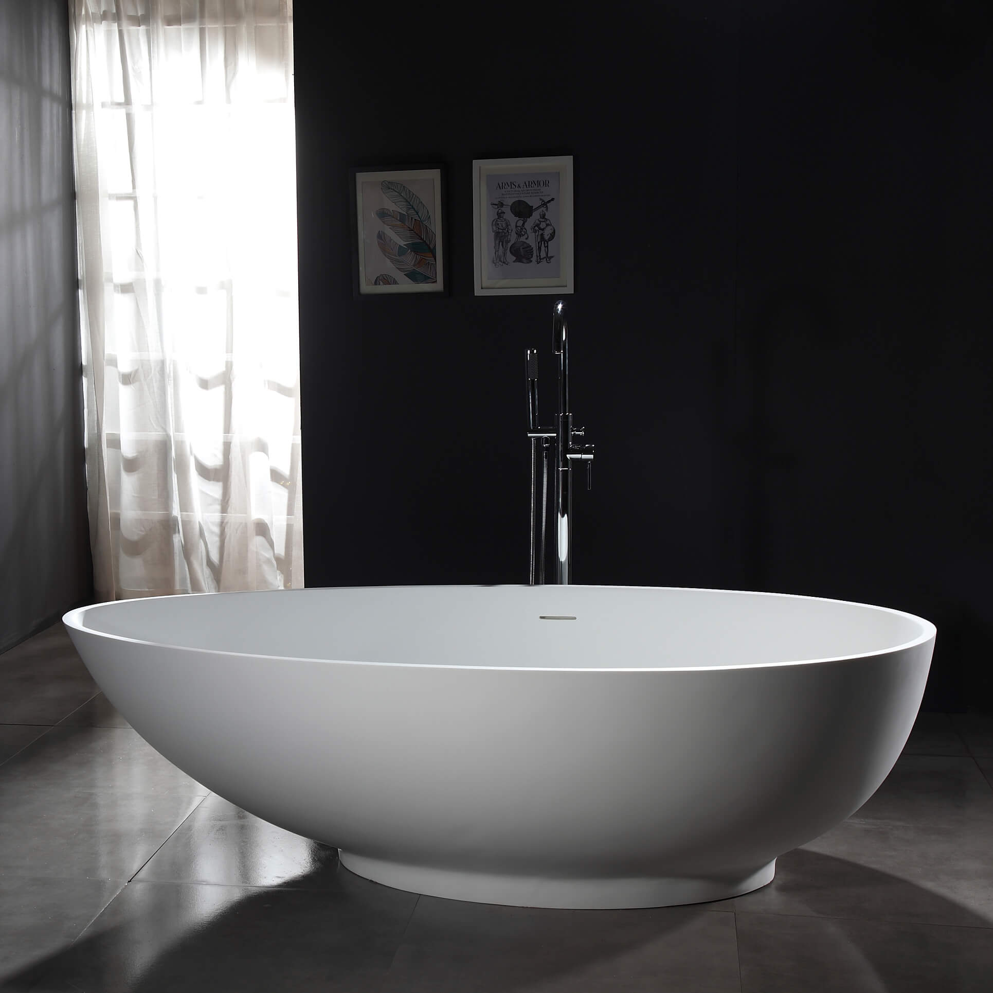 Top-down view of the oval freestanding stone resin bathtub accentuating its modern design.