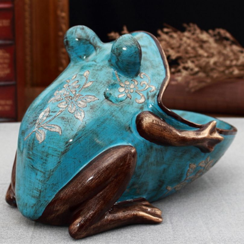 Charming retro frog sculpture showcasing an irregular shape for unique home storage.