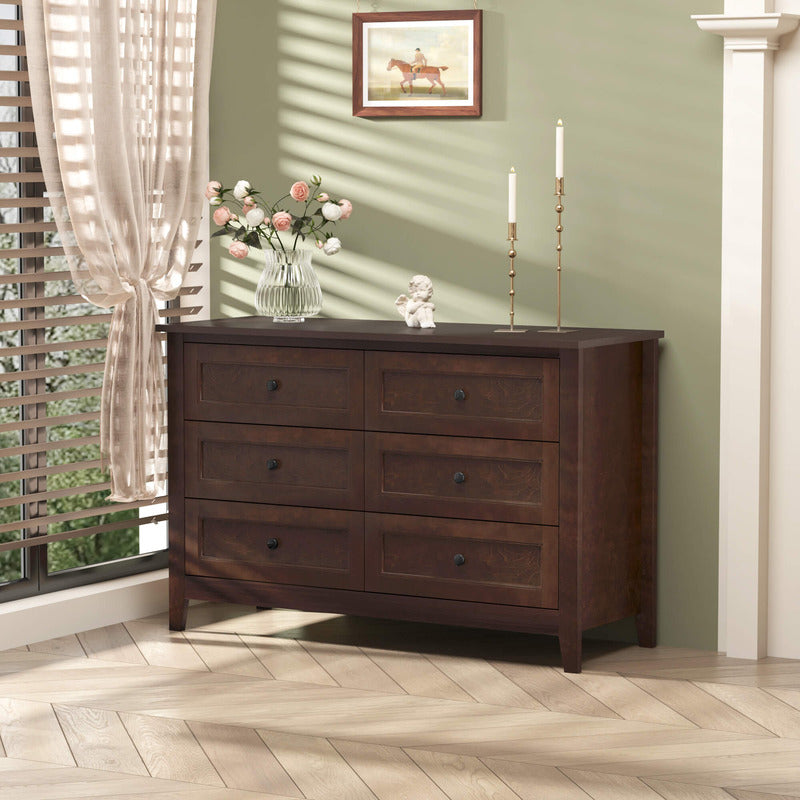 Close-up of the antique auburn finish on the wooden furniture, highlighting its craftsmanship.