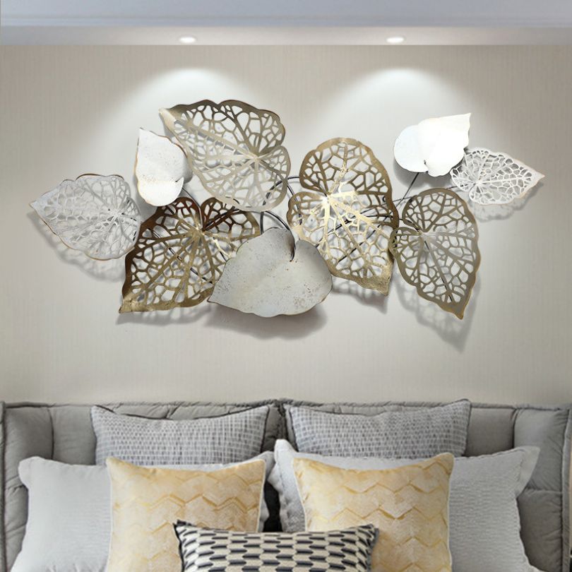 Close-up view of the unique iron leaf wall decor, highlighting the intricate details and colors.