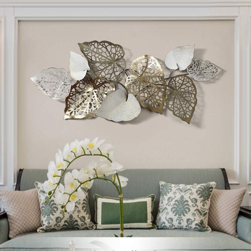 Close-up view of the unique iron leaf wall decor, highlighting the intricate details and colors.