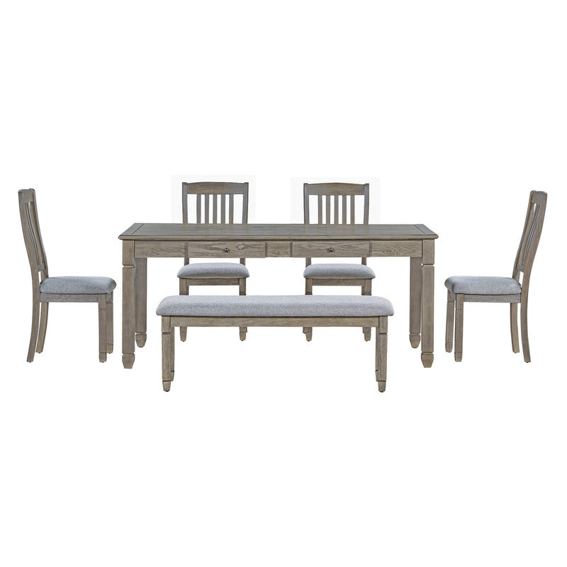 Close-up of the grey rectangular dining table with four drawers and tapered legs.