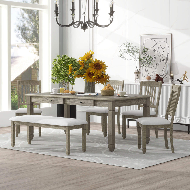 Comfortable upholstered chairs and dining bench in a stylish dining setup.