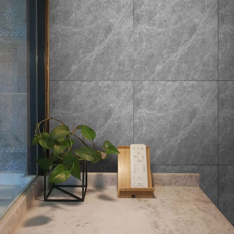 Retro marble peel and stick wallpaper panel installed in a stylish living room, showcasing its elegant design.