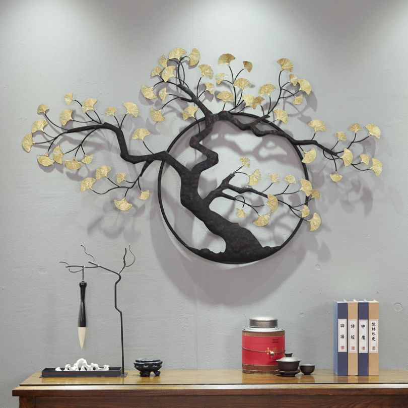 A stylish office space featuring decorative metal art with a unique tree design for an inspiring atmosphere.