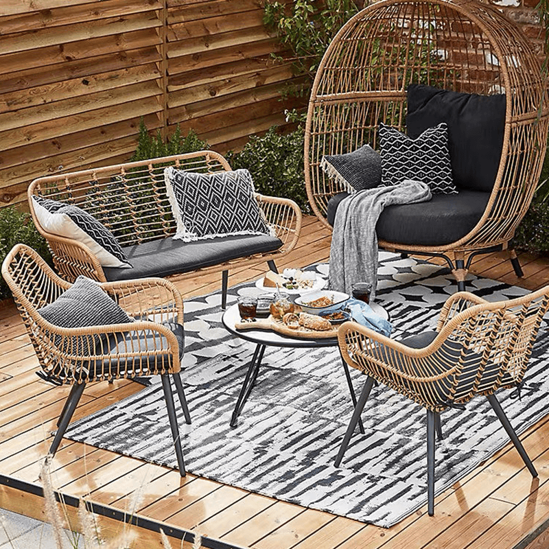 Close-up of the braided wicker design of the Retro Ventura Rattan Lounge Chair.