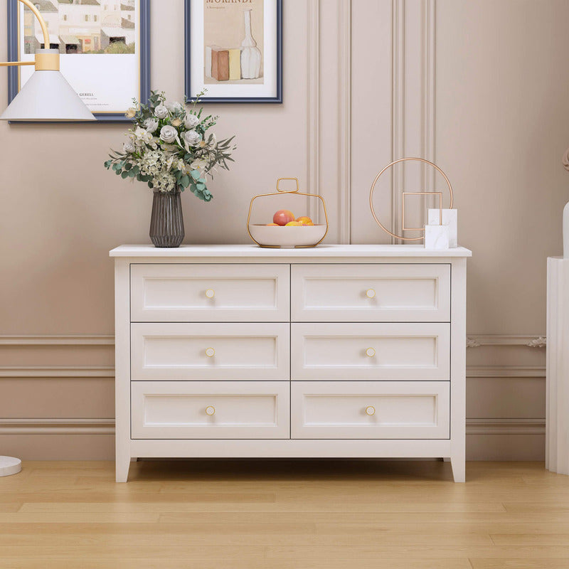 Front view of Vintage Charm 6-drawer white wood cabinet showcasing its elegant design.
