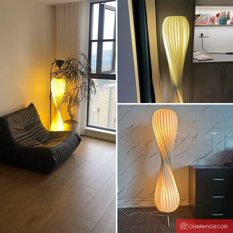 The fabric LED floor lamp illuminating a cozy reading nook.