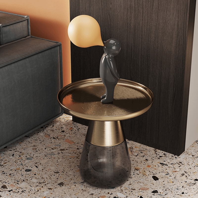 Full view of the round glass table placed beautifully in a decorated living space.