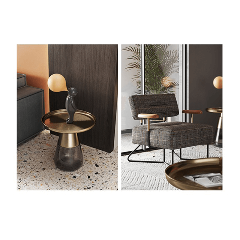 Modern round glass coffee table showcasing its clear surface in a contemporary living room.