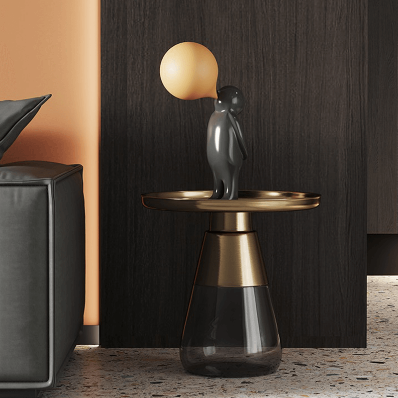 Close-up view of the unique glass coffee table highlighting its elegant design and color options.