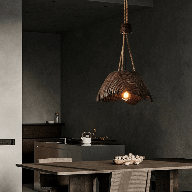Stylish hemp rope lamp for cafes illuminating a rustic bar scene.