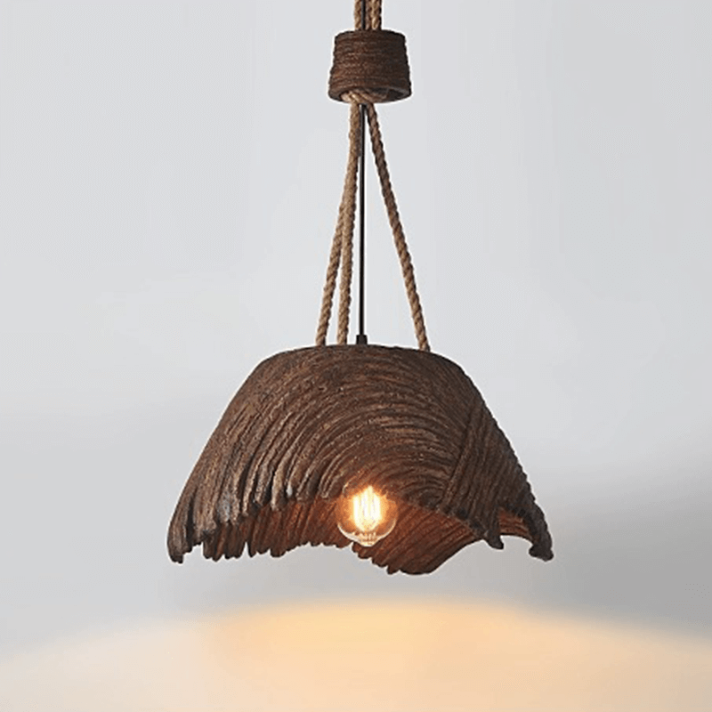 Rustic hemp rope pendant lamp showcased in a modern dining room.