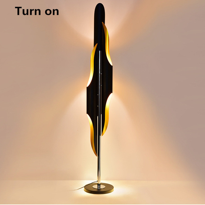 Elegant lamp placed beside a bed, demonstrating its use as a cheap bedside lamp for the living room.
