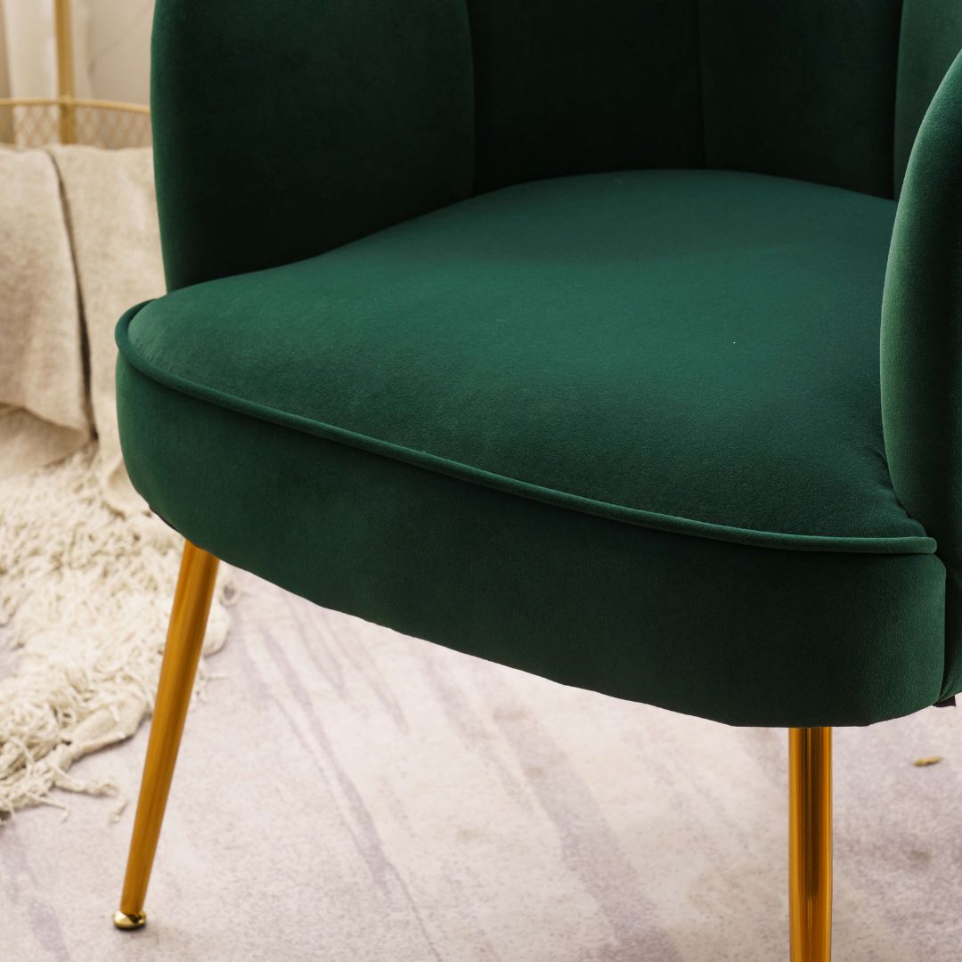Cozy living room setup featuring the stylish dark green velvet chair.