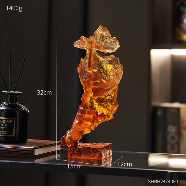 Silent Mask sculpture displayed in a contemporary living room setting, highlighting its artistic decor appeal.