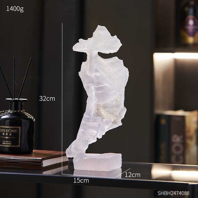 Close-up view of the Silent Mask resin sculpture showcasing its intricate design and texture.